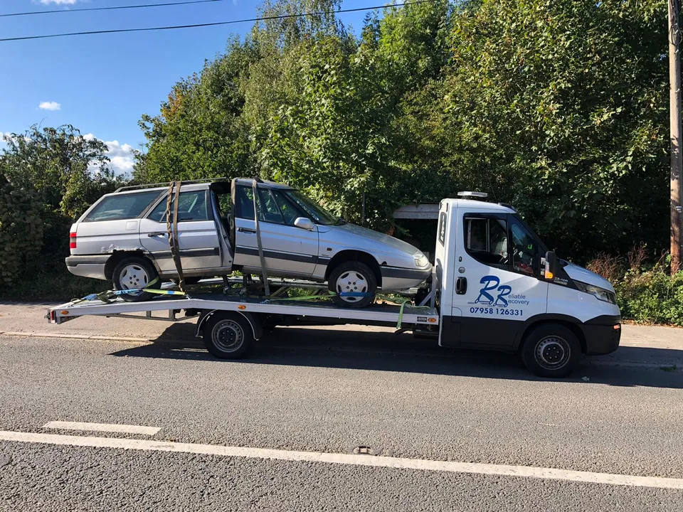 Car being loaded for dealer and auction collection in London